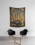 Vintage style wall tapestry with a ship named Arirang, seven figures on deck and the word Swim in the clouds, BTS inspired room decor, hung above two black chairs"