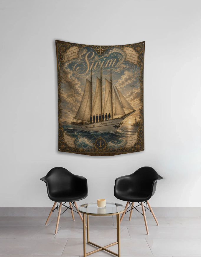 Vintage style wall tapestry with a ship named Arirang, seven figures on deck and the word Swim in the clouds, BTS inspired room decor, hung above two black chairs"