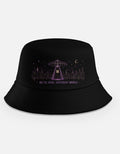 Black bucket hat with purple UFO beaming light over a city skyline at night with text we're here different world, BTS alien theory inspired design"